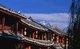 China: Jade Dragon Snow Mountain appears over old Lijiang, Lijiang Old Town, Yunnan Province